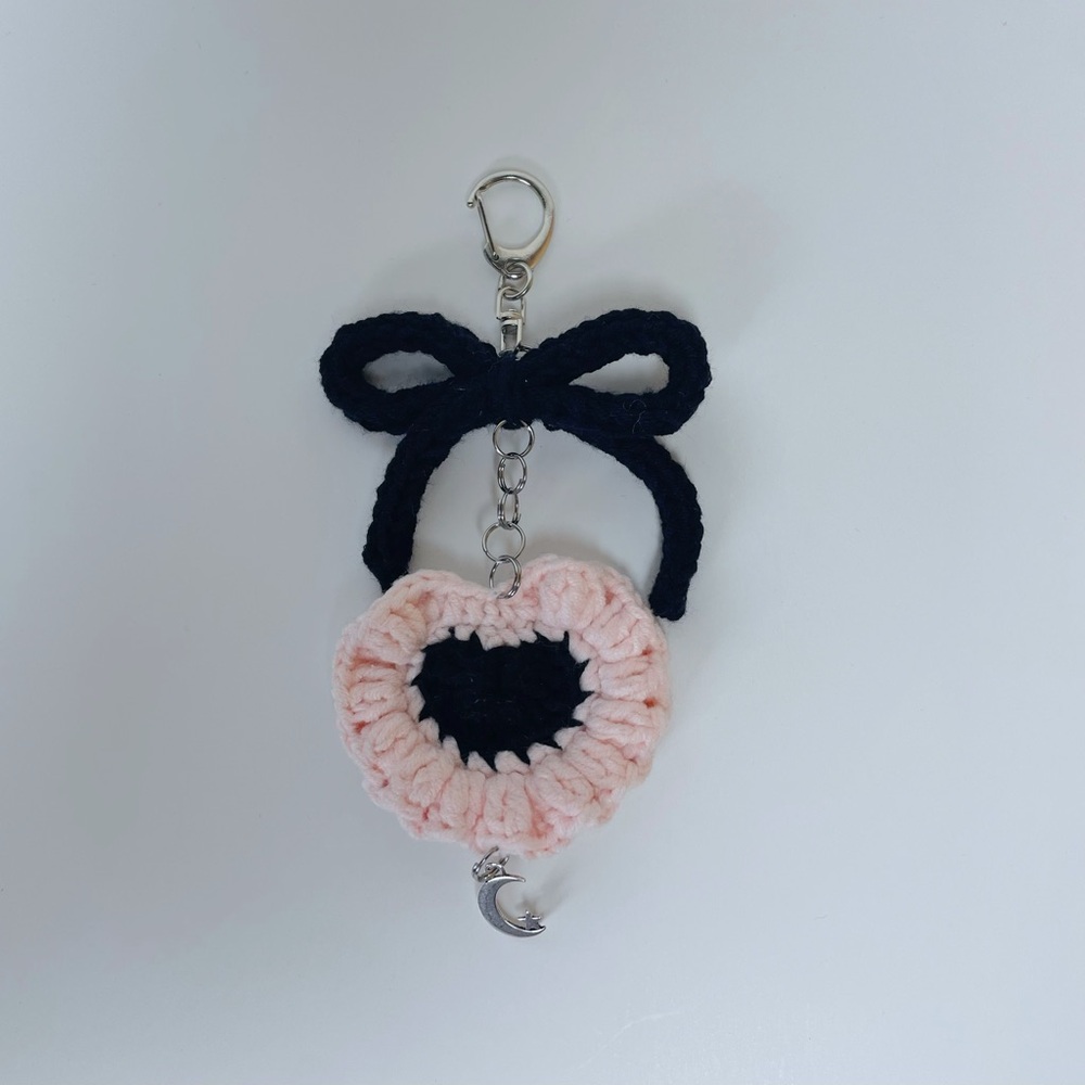 Handmade crocheted / knitted heart with bow keychain